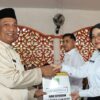 Bupati Rohul Menyerahkan Surat Keputusan CPNS Pemkab Rohul untuk Tahun Anggaran 2024